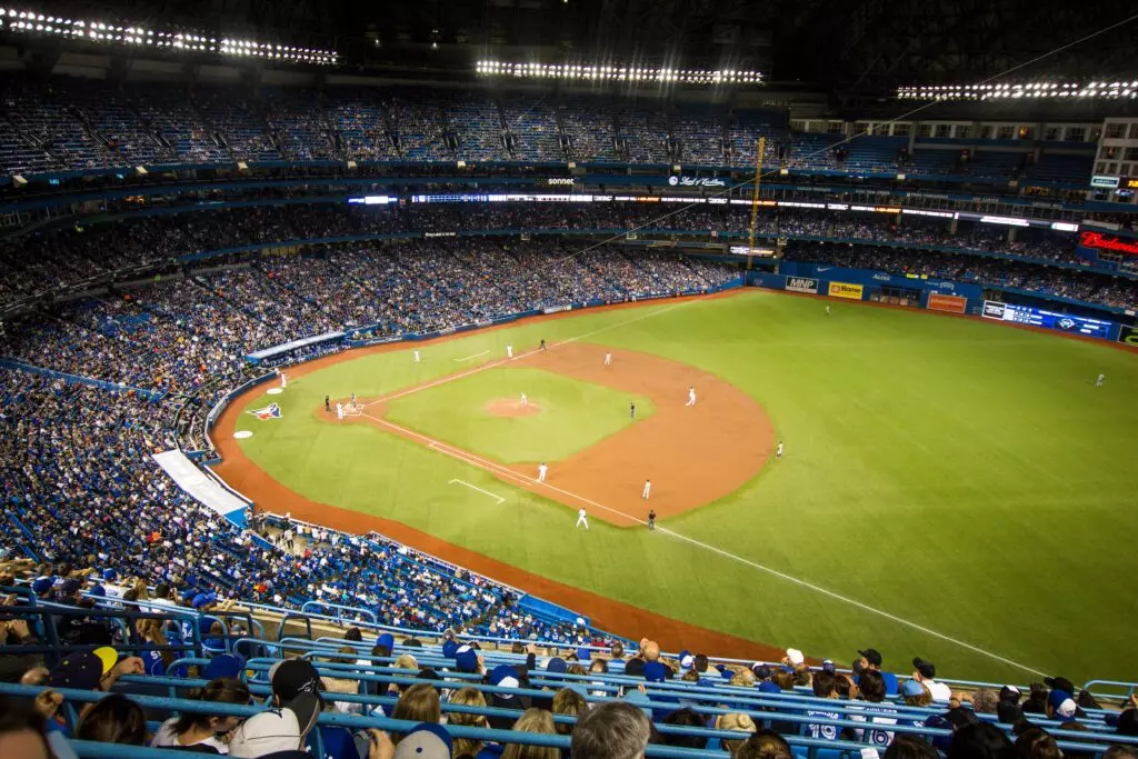 horizontal shot crowded yankee baseball stadium players field