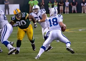 800px Peyton Manning 18 pursued by B.J. Raji 90