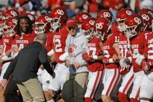 Home 6 Oklahoma Sooner Head Coach Brent Venables leads the Oklahoma Sooners football team out on to the field.