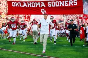 Home 14 Brent Venables runs on the field before an NCAA football game between University of Oklahoma (OU) and Iowa State at the Gaylord Family Oklahoma Memorial Stadium in Norman, Okla., on Saturday, Sept. 30, 2023.