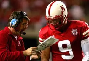 Home 6 Coach Bill Callahan of the Nebraska Cornhuskers gives a play to quarterback Sam Keller #9 while playing the USC Trojans on September 15, 2007 at Memorial Stadium in Lincoln, Nebraska.