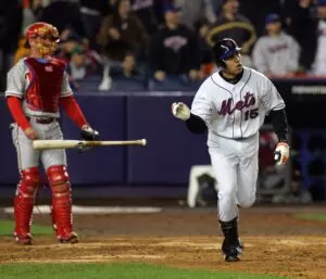 Home 8 The Mets Carlos Beltran tosses his bat aside after hitting a three-run homer in the 7th inning, as Phillies catcher Mike Lieberthal looks on in Queens on May 2, 2005.