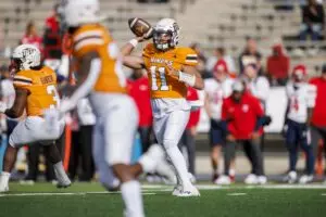 UTEP Miners quarterback Cade McConnell (11) drops back to pass the ball against No. 22 Liberty Flames defense during the first half at Sun Bowl Stadium.