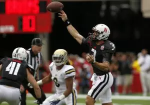 Nebraska Cornhuskers quarterback Taylor Martinez (3) passes against the UCLA Bruins in the third quarter at Memorial Stadium.