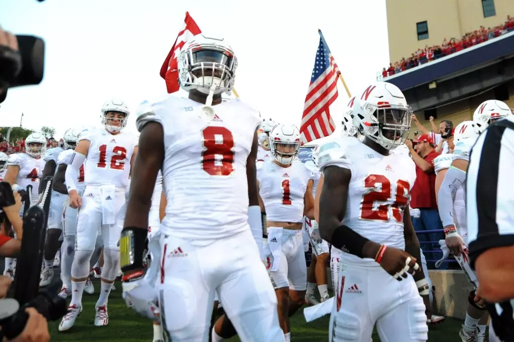 The Nebraska Cornhuskers make their way to the field prior to a game against the Northwestern Wildcats at Ryan Field.