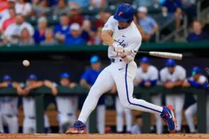Florida utility Jac Caglianone (14) hits during the first inning of an NCAA baseball matchup at 121 Financial Ballpark in Jacksonville, Fla. Florida State defeated Florida 14-3.
