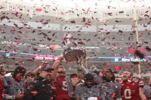 Home 4 Nebraska Cornhuskers head coach Matt Rhule and players celebrate after the game against the Boston College Eagles at Yankee Stadium.