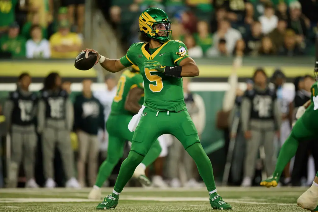Dante Moore throws a pass during the first half against the Portland State Vikings. All eyes will be on him and the Oregon Ducks this weekend as Big Ten football kicks into high gear.