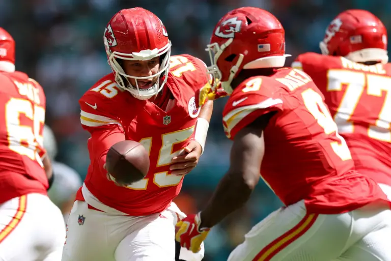 Patrick Mahomes hands off the ball to Kenneth Walker III during the third quarter. It was a win, but an ugly win for Kansas City. Have the Dolphins exposed the Chiefs' biggest flaws that other teams can capitalize on?
