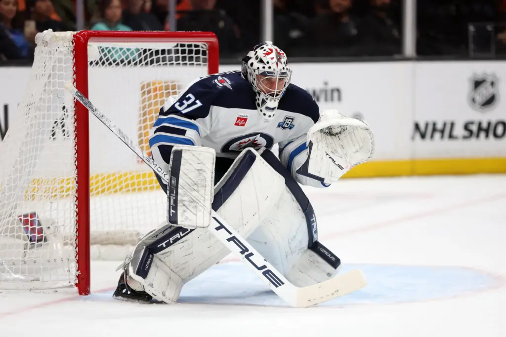 Addition of Goalie Connor Hellebuyck Makes the Devils a Stanley Cup Dark Horse 2 Connor Hellebuyck standing in goal