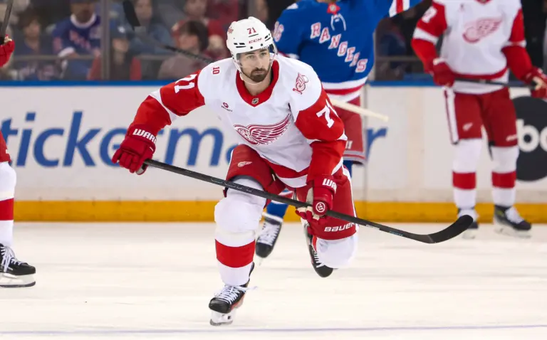 Dylan Larkin skates against the New York Rangers at Madison Square Garden. Experts continue to analyze potential Larkin trade destinations as rumors surround the Detroit Red Wings former captain.