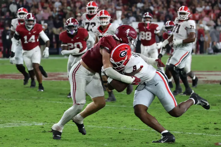 Home 1 Luke Metz tackles Ethan Barbour. Leading his team in tackles, Metz is one of the Alabama Crimson Tide defensive standouts to watch for the rest of the season.