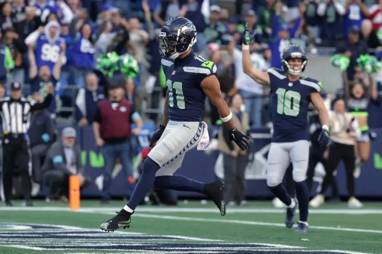 Home 2 Jaxon Smith-Njigba celbrates after catching a touchdown pass. Will the Denver Broncos find a way to contain him for the Thursday Night Football game tonight?
