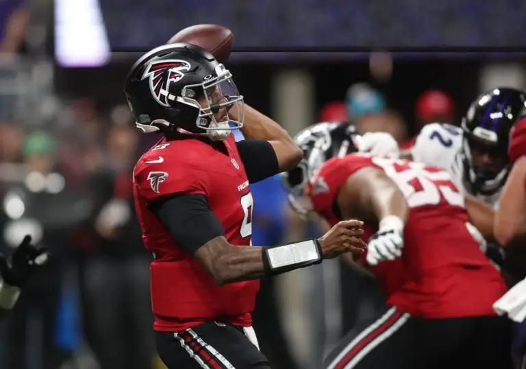 Home 2 Michael Penix Jr. throws during the fourth quarter against the Baltimore Ravens. When it comes to a Penix Jr. report card, what grade would you give the Atlanta Falcons quarterback so far?