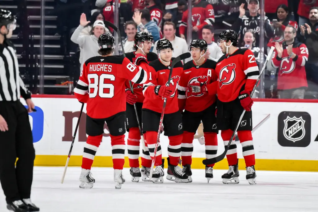 Addition of Goalie Connor Hellebuyck Makes the Devils a Stanley Cup Dark Horse 3 The Devils celebrate a goal