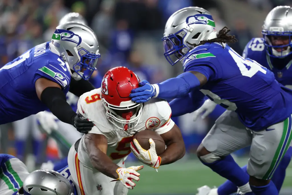 Kenneth Walker gets tackled against Seahawks