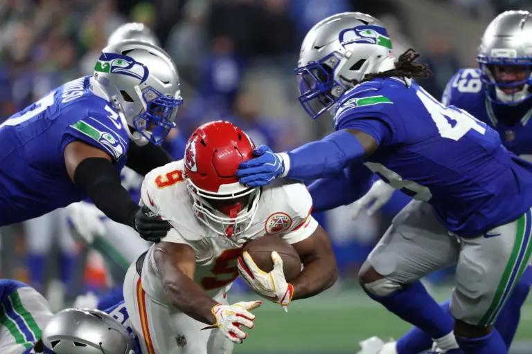 Home 1 Kenneth Walker gets tackled against Seahawks